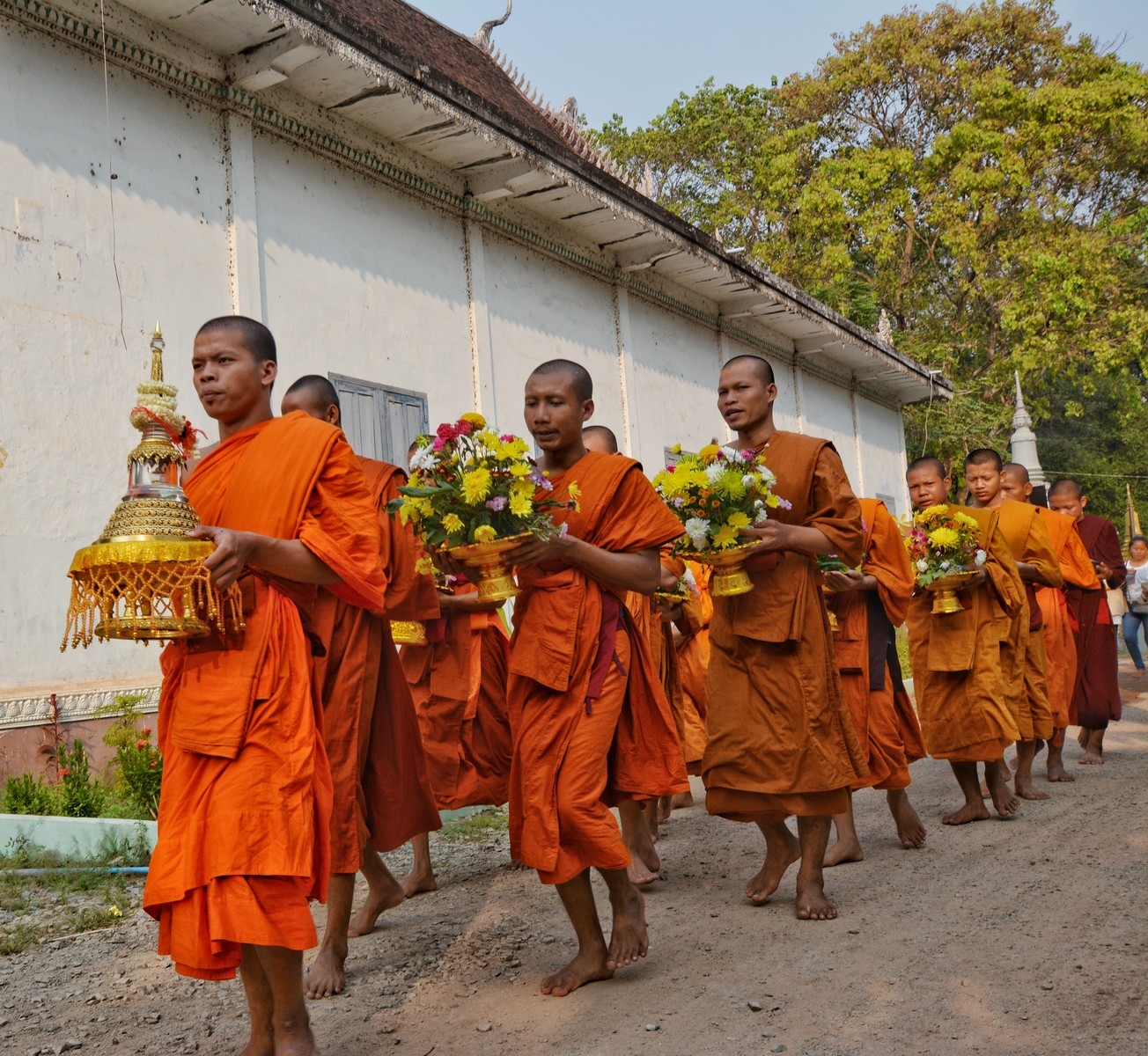 buddhist monk procession near angkor wat